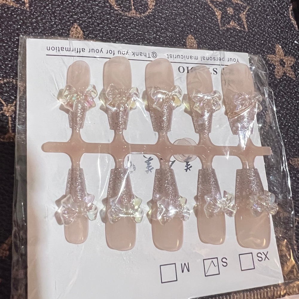 2/$15 Elegant Nude Press-On Nails with Glitter and Bow Accents